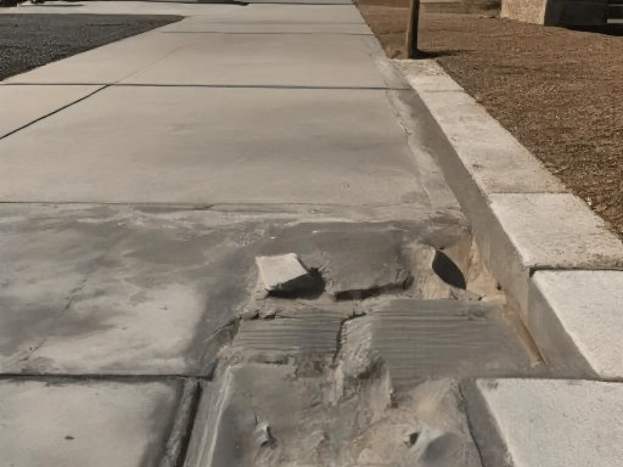 Queens - sidewalk curb repair - body